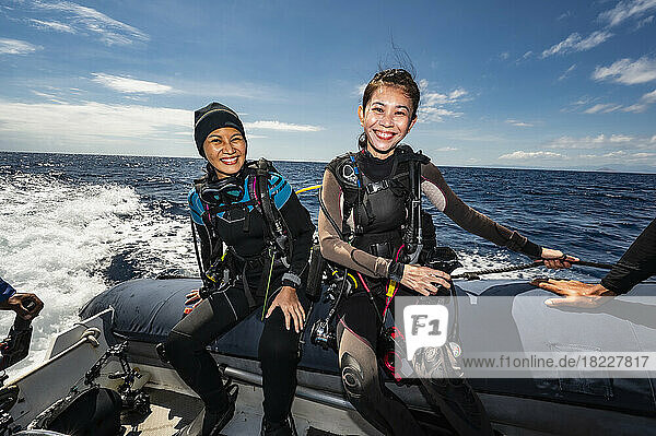 divers on the way to a dive site close to Flores Island in Komodo