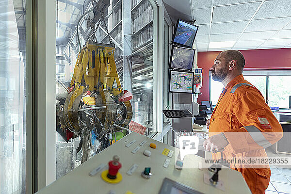 Male operator in waste to energy power station