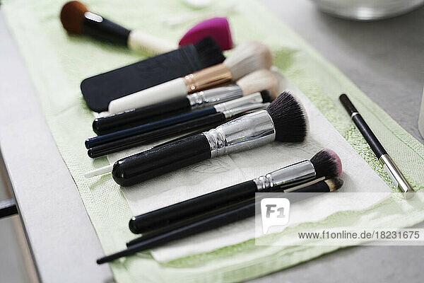 Make-up brushes on table in salon