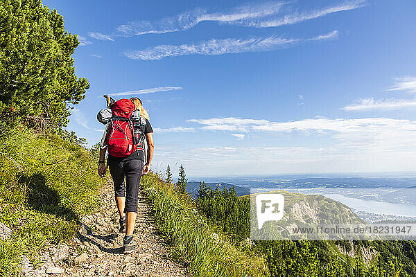 Germany  Bavaria  Female hiker on way to summit of Hirschberg mountain
