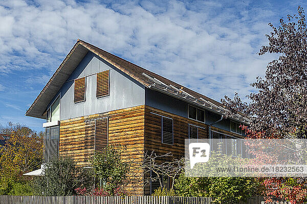 Germany  Bavaria  Munich  Exterior of modern passive house with wooden walls