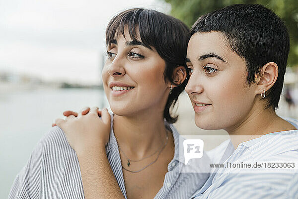 Thoughtful lesbian couple with each other