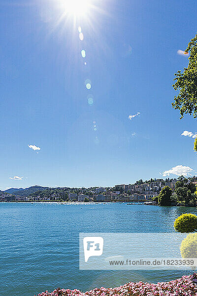 Switzerland  Ticino Canton  Lugano  sun shining over Lake Lugano