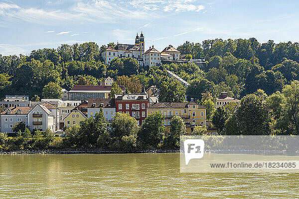 Germany  Bavaria  Passau  Inn River in summer with Wallfahrtskirche Mariahilf church in background