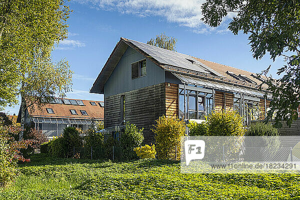 Germany  Bavaria  Munich  Yard behind modern energy efficient suburban houses