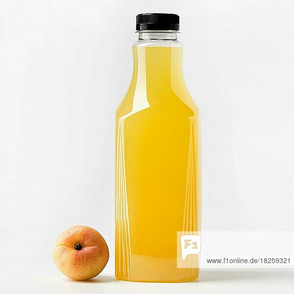 Front view juice glass bottle with peach