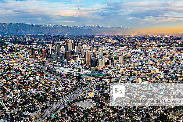 Downtown Los Angeles Snow Peaked Mountains Aerial Sunset
