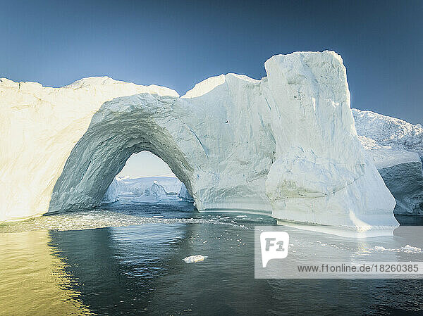 big arch in icebergs from aerial view