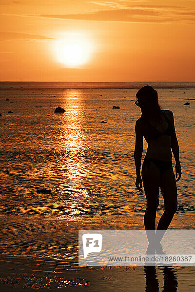 Silhouette of Woman in Sunset Beach  Gili Trawangan  Indonesia