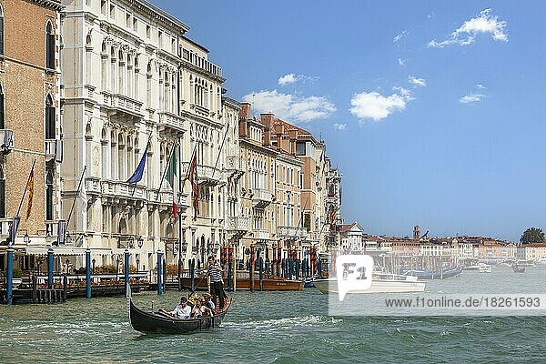 Grand Canal  gondola with tourists and motorboats  Venice  Veneto  Italy  Europe