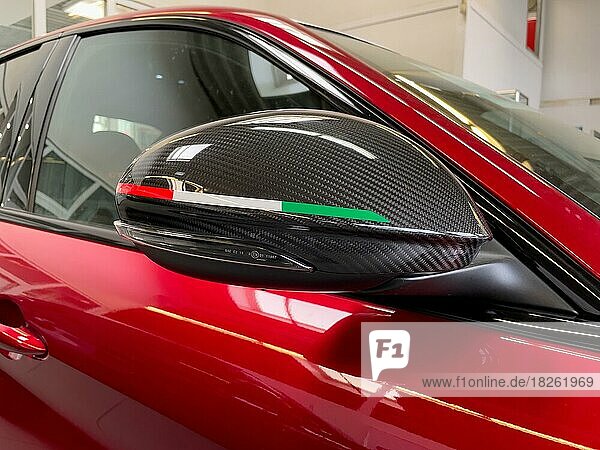 Rear view mirror with carbon fairing with coloured stripes of Italian national colours national flag Tricolore of limited edition 500 pieces Italian sports car Alfa Romeo Giulia GTAm  Germany  Europe