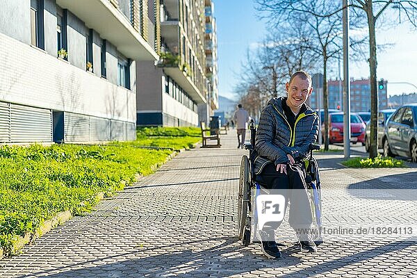 A disabled person having fun walking on the street in a wheelchair  rehabilitation