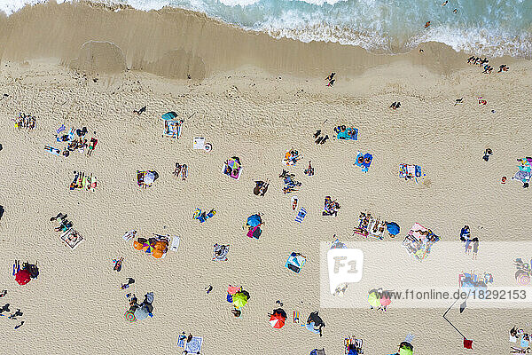 Spain  Majorca  Aerial view of people relaxing on Cala Agulla beach