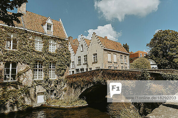 Belgium  West Flanders  Bruges  Old arch bridge over city river