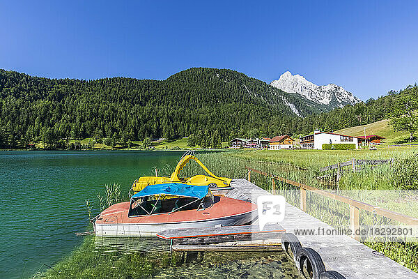 Germany  Bavaria  Boats at jetty of Lautersee lake in summer