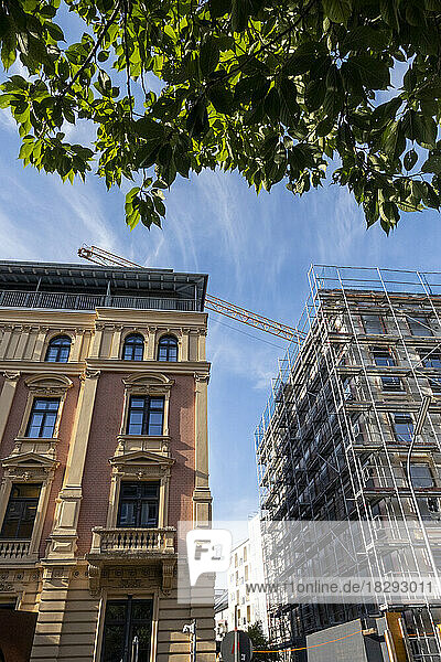 Germany  Bavaria  Munich  Palais Ingenheim-Molitor office with crane looming in background
