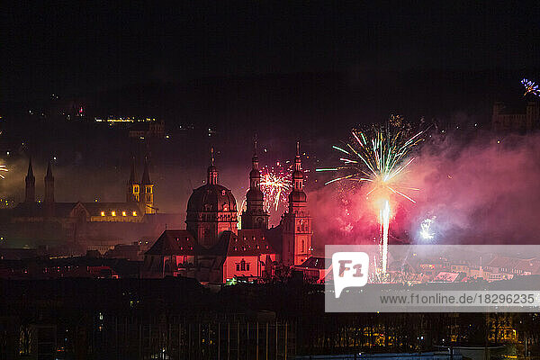 Germany  Bavaria  Wurzburg  New Years Eve fireworks exploding over Haug Monastery