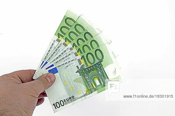 100 Euro Banknoten  als Fächer in einer Hand gehalten
