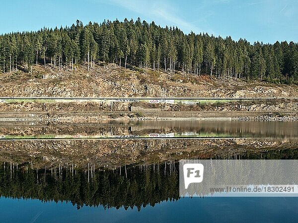 Reflection of the shore enclosure of the Schluchsee  Schluchsee  Black Forest  Germany  Europe