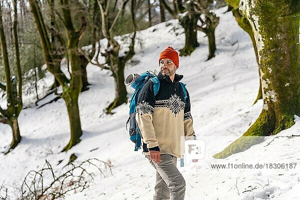 Portrait of a hiker on a snow trekking  winter adventures  natural activity