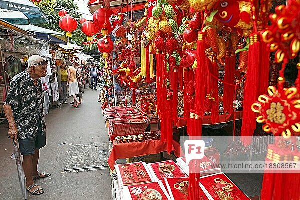 Red lamps and pendants in a market alley  Chinatown  Singapore  Asia