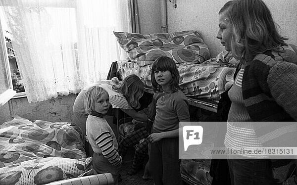 The residents of this homeless shelter in Düsseldorf  located directly on the motorway  here on 11.6.1974  are predominantly families with many children  Germany  Europe