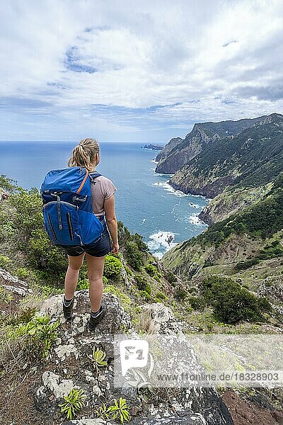Hiker on the Vereda do Larano trail  cliffs  Madeira  Portugal  Europe