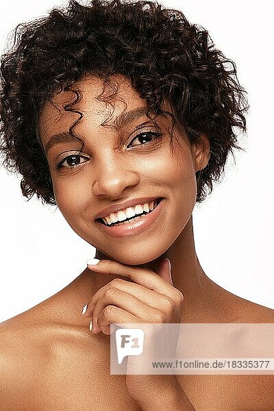 African American skincare models with perfect skin and curly hair. Beauty spa treatment concept