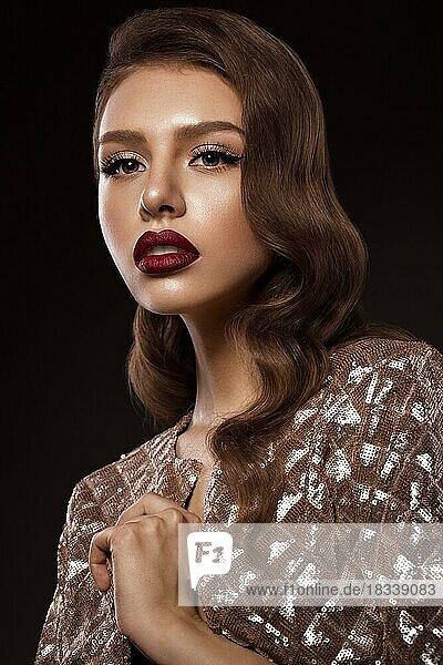 Beautiful girl in Hollywood image with wave and classic makeup. Beauty face. Photo taken in the studio