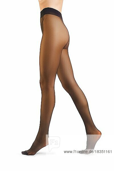 Perfekte Beine einer Frau in Strumpfhosen vor weißem Hintergrund