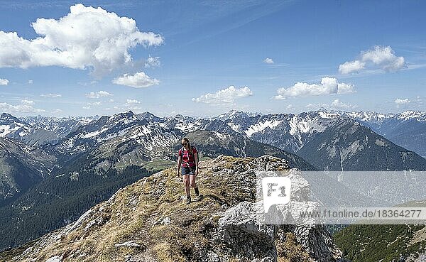 Hiker on hiking trail to Thaneller  Lechtal Alps  Tyrol  Austria  Europe