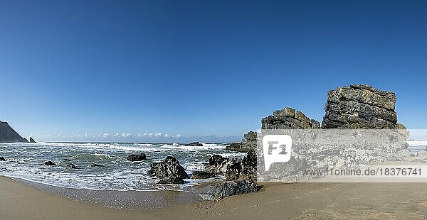 Rocky coast and sandy beach at Praia da Adraga  Colares  Portugal  Europe