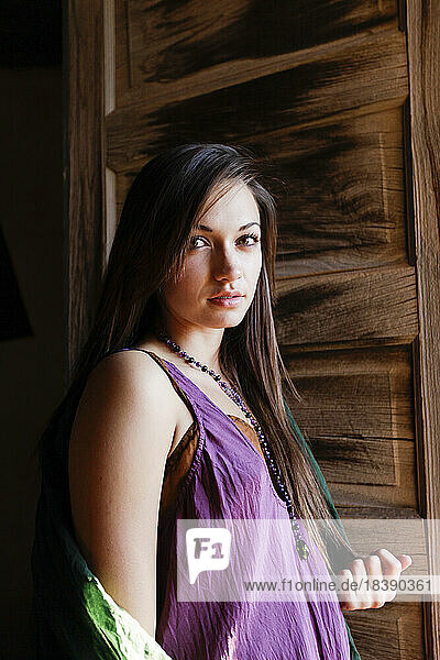 Santa Fe New Mexico United States Young woman in doorway Model released
