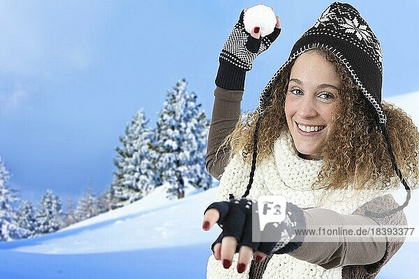 Woman throws a snowball