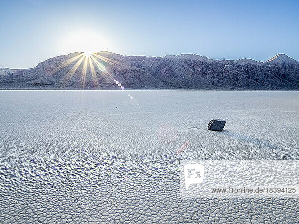 A moving rock at the Racetrack  a playa or dried up lakebed  in Death Valley National Park  California  United States of America  North America