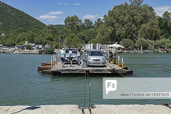 Cars on primitive cable ferry crossing the Vivari Channel near Butrint National Park  Vlorë County  southern Albania
