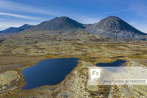 Aerial view over the Norwegian tundra in autumn  fall showing lakes and mountains  Innlandet  Eastern Norway