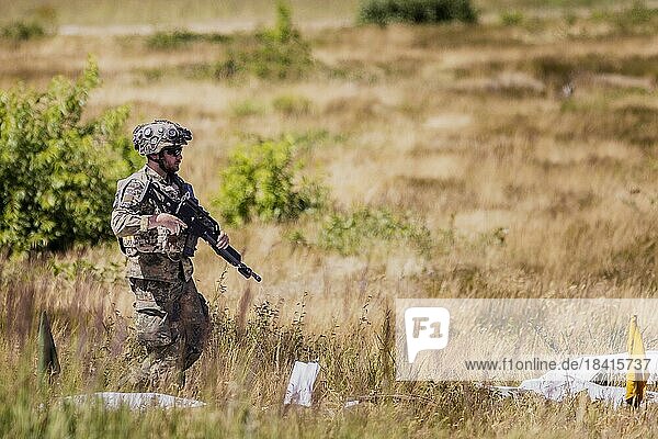 A soldier of the Jägerbataillo photographed during an exercise of a combat situation at the Bundeswehr Combat Training Centre in Letzlingen  The soldiers wear AGDUS equipment (Training Equipment Duel Simulator)  with the help of which combat can be simulated  documented and analysed  Letzlingen  Germany  Europe