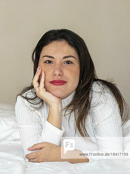 Woman  relaxed  looking into camera  portrait format