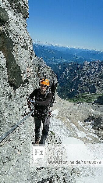 Passage via ferrata with a large exposure and an amazing view of the mountain range and the glacier. Zugspitze massif  Bavarian Alps  Bavarian Alps  Germany  Europe
