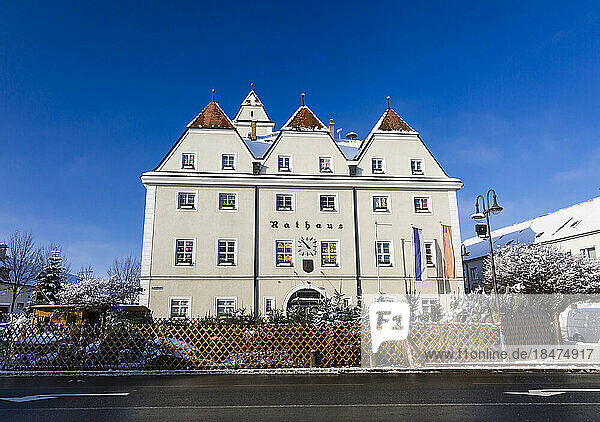 Austria  Lower Austria  Ganserndorf  Facade of white-painted town hall in winter