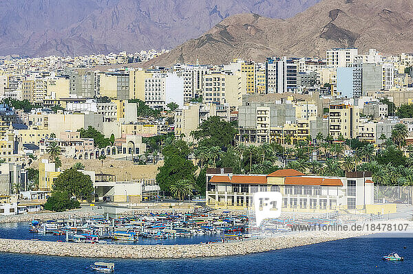 Seaport and buildings at Aqaba on sunny day