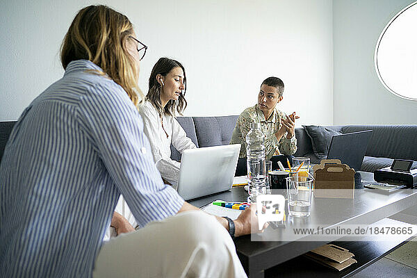 Businesswomen working together sitting at home office