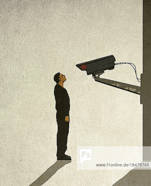Illustration eines Mannes  der vor einer Überwachungskamera steht