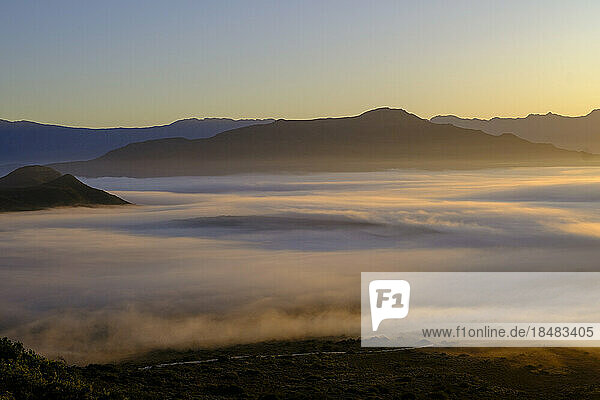 Langeberg mountainous landscape with fog at sunrise