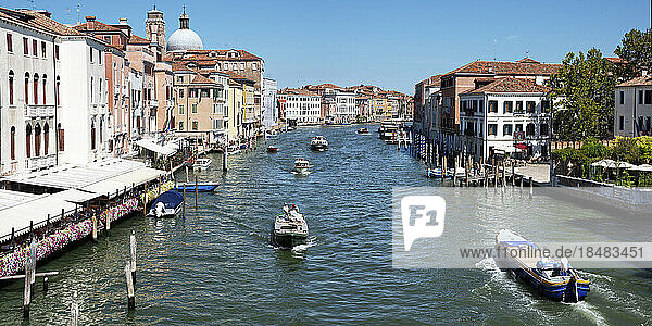 Canal with gandola on sunny day at Venice  Italy