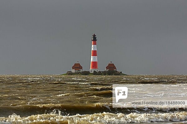 Lighthouse Westerheversand at Westerhever during high water spring tide  storm surge  Peninsula of Eiderstedt  Wadden Sea NP  North Frisia  Germany  Europe