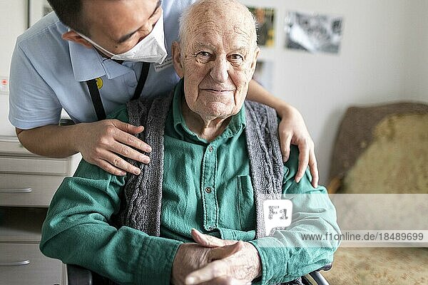Geriatric nurse talking to a resident in a nursing home  Heidelberg  Germany  Europe