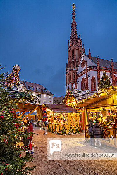 View of Christmas market and Maria Chappel in Marktplatz  Wurzburg  Bavaria  Germany  Europe