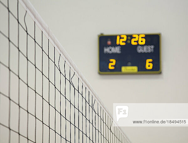 A school sports hall  the electronic scoreboard.